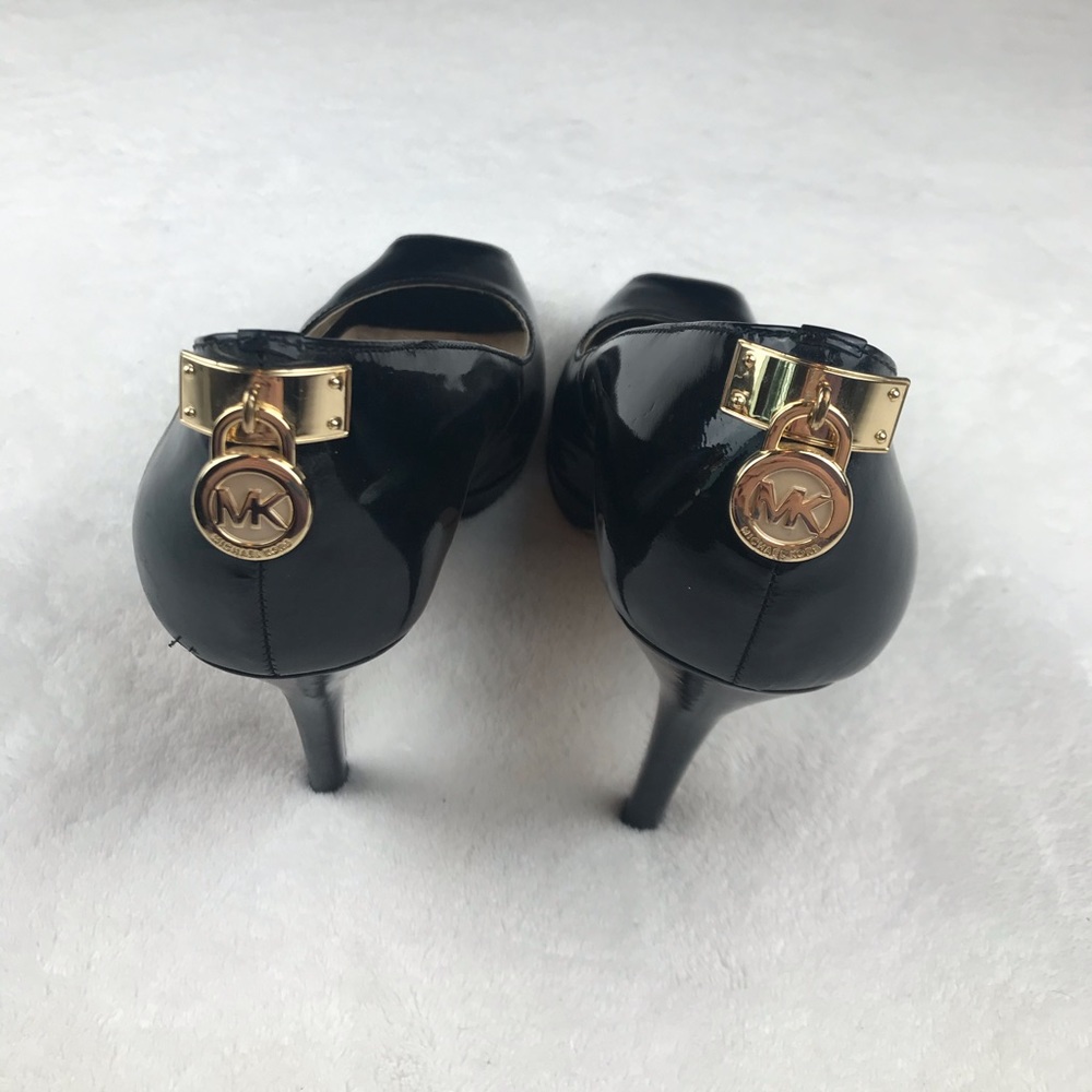 Michael Kors patent leather gold logo medal @ heel